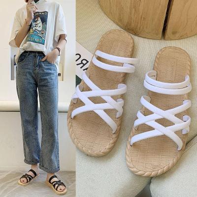 China Fashion trend new summer hot-selling women's slippers shape outdoor beach flat slippers lightly tie roman style women's sandals for sale