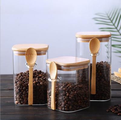 China Freshness Preservation 27Oz/800ML Square Food Glass Jar With Spoon And Lid For Storing Tea Coffee Sugar Spice for sale