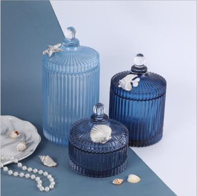 China Mirez Do Geo Embossed Luxury Blue Empty Ribbed Cut Glass Candle Container Jar With Glass Lids for sale