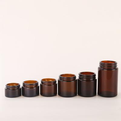 China Modern Mini Size Wholesale Luxury Amber Empty Glass Jars Packaging For Candle Making for sale