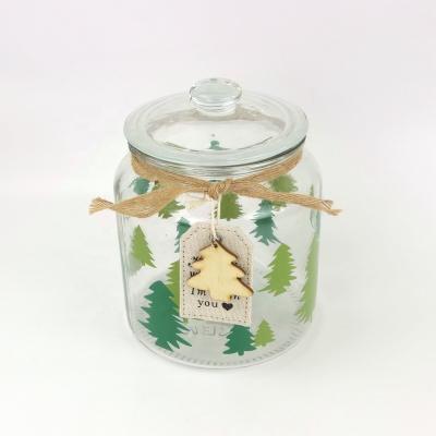 China Christmas Round Food Storage Viable Lid Glass Jar With Christmas Tree Snowflake Decal Pattern for sale