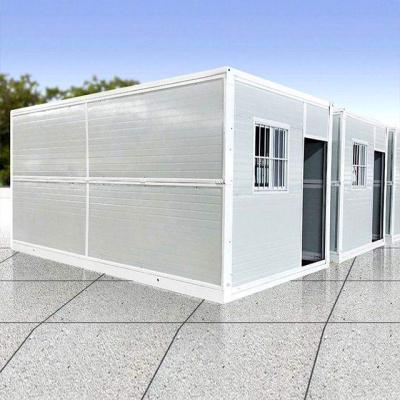 China Modular Prefab Farmhouse Low Cost Office Folding Container Homes 20ft Portable Foldable House for sale