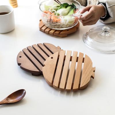 China Japanese Style Pot Pan Pad Creative Solid Wood Black Walnut Viable Wooden Fish The Heat Insulation Bowl Teapot Mat Heat Resistant Place for sale