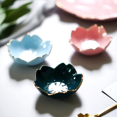 China Viable Japanese Sakura Shape Mini Ceramic Soy Sauce Dipping Dish Fruit Sushi Wasabi Vinegar Dish Restaurant Home Seasoning Bowl for sale