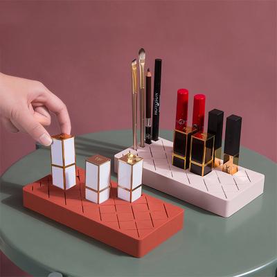 China Viable DROP 12/24/36 Grids Silicone Lipstick Holder Makeup Brush Eyebrow Pencil Mascara Storage Box Cosmetic Display Holder Desk for sale