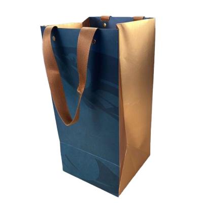 China Handmade 2023 Luxury custom logo blue and gold gift paper shopping bag for sale