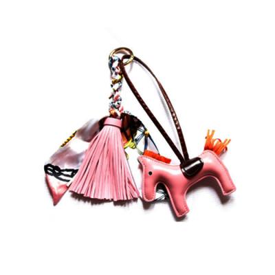 China Handmade Bow Silk Leather Tassel Decoration Pony Jewelry Car Key Pendant for sale