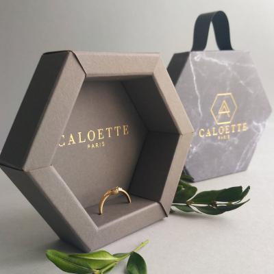 China Recyclable Custom Hexagon Box With Handle Logo Customized Hot Stamping Eco Friednly for sale