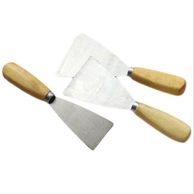 China Wall Cleaning Daily Necessities 3 Inch Handle Wood Oil Putty Knife With Teeth for sale