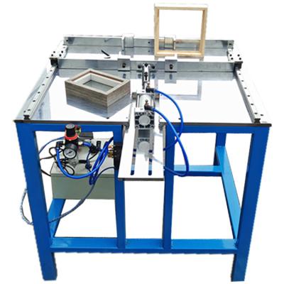 China Building Material Shops Full Automatic Joint Picture Frame Machinery Photo Frame Underpinner for sale