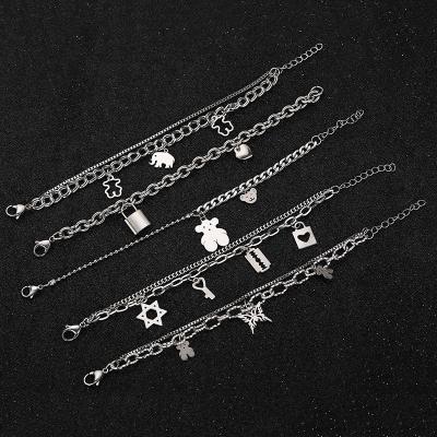 China CLASSIC Custom Stainless Steel Charm Bracelet Gold / Silver Cute Animal Pendant Women Bracelet Bangle for sale