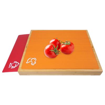 China Sustainable Natural Kitchen Custom Bamboo Wooden Cutting Board With Removable Color Coded Plastic Mats for sale