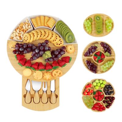 China Large Sustainable Cheese Board Bamboo Charcuterie Board Set and Knife Set with Extra Utensils and Bowls for sale