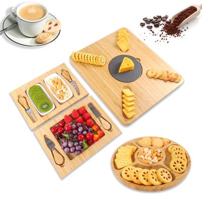 China Large Sustainable Bamboo Cheese Cutting Dishes Panel Set and Knife Set with Hidden Slide Out Drawers Charcuterie Tray Wood Panel for sale