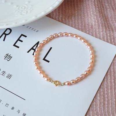 China CLASSIC natural freshwater single pearl bracelet 14K gold plated small rice bracelet pearl clasp send girlfriend gift fashion jewelry for sale