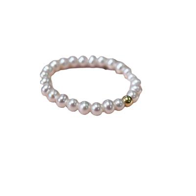 China Trendy Seawater Beads Akoya Rare Aurora Pearls 2-3 Mm 18K Gold Minibaby Stretch Ring for sale