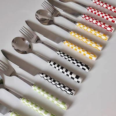 China Joy Tableware Flatware With Porcelain Colorful Handle Lattice Flatware Set for sale