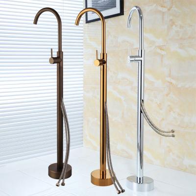 China Freestanding Gold Bathtub Faucet Slide Bar Faucet With Hand Shower Mixer Tap Faucet Set Type Shower Floor Faucet for sale