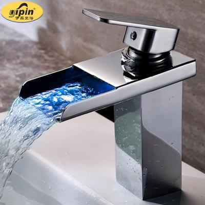 China Waterfall Basin Mixer Taps Single Lever Bathroom LED Brass Waterfall Basin Faucet for sale