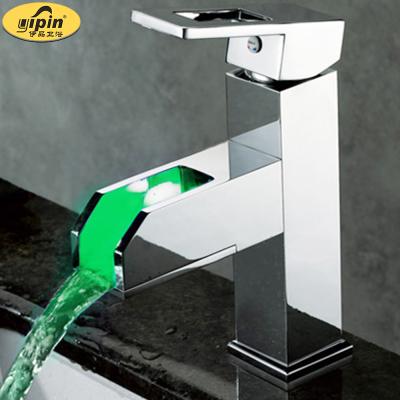 China Fancy Bathroom Basin Faucets Waterfall Faucet Retailers Brass Metered Sink With Led Light Basin Faucets Mixer for sale