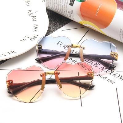 China Wholesale 2022 Fashion Sunglasses B2251 High Quality Heart Glass Rimless Girls Shape Kids Fashionable Sunglasses Children for sale