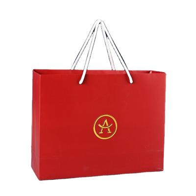 China Recyclable Custom Luxury Shopping Gift Paper Bag With Your Own Logo Fashion Shopping Bag With Handle for sale