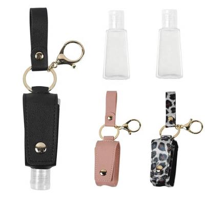 China ZIXU 30ml Personal Care Plastic Empty Clear Squeeze Container Flip Cap Bottles Leather Keychain for sale