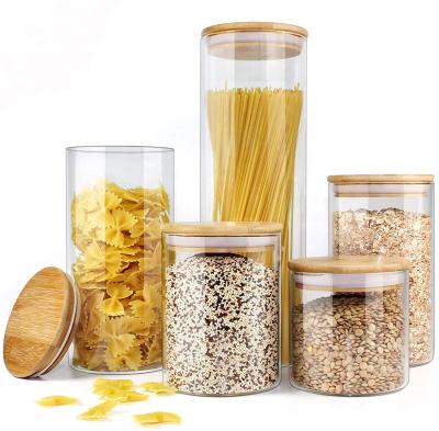 China Large 250ML Sustainable Kitchen Clear Glass Jars With Airtight Bamboo Lids for sale