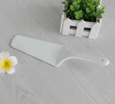 China Supplier Viable China Wholesaler Cheap Price Porcelain Spatula Pizza Cutter Bone China Cake Shovel for sale