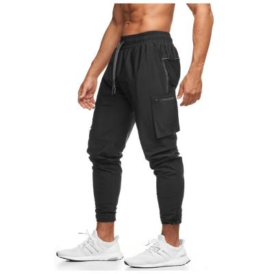 China New Custom Mens Running Sweatpants Breathable Jogger Sport Workout Pants Gym Pants With Zipper Pockets for sale