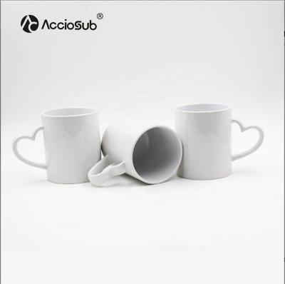 China Viable Acciosub Customized Logo 11oz White Coffee Mug Promotional Gift Sublimation Mug Ceramic Heart Handle for sale