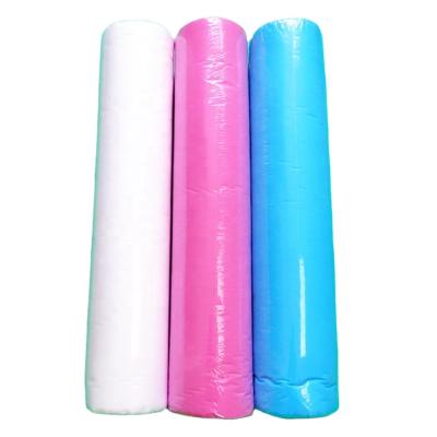 China Beauty Salon Spa Breathable / Soft Massage Perforated Non Woven Breathable Disposable Bed Sheets Rolls for sale