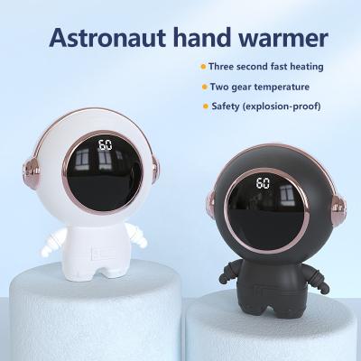 China Hand Warmer Astronauts New Hand Warmers Power Bank Pocket Astronaut Portable USB Digital Display Charging Electric Heater for sale