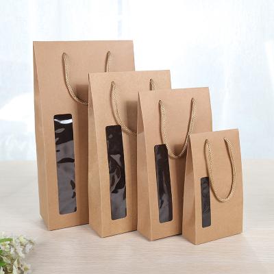 China Clear Pockets Logo Craft Paper Bag Custom Window Candy Recyclable Gift Bag Wholesale for sale