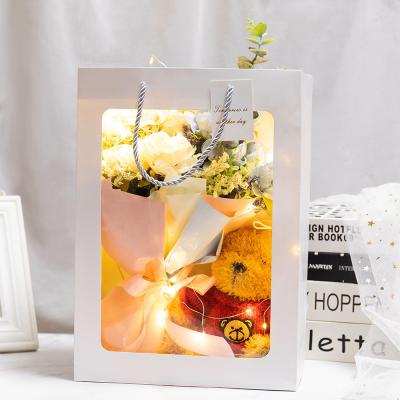 China Recyclable Bouquet Flower Window Bag Gift Companion Festival Handbag Transparent Gift Bag for sale