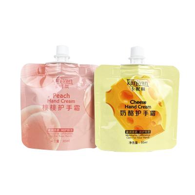 China Custom Logo Moisture Proof Mini Spout Squeeze Stand Up Pouch Doypack Aluminum Foil Bag With Cap For Cosmetic for sale