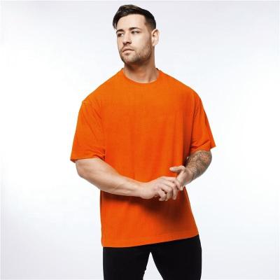 China Anti-Wrinkle Gym Clothing Fitness Men Fashion Causal Oversized T-Shirt Loose Half Sleeve T-shirt Muscleguys Bodybuilding T-shirt for sale