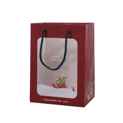 China Custom Recyclable Christmas Paper Bag Christmas Gift Bag With Ribbon Paper Bag With PVC Window for sale