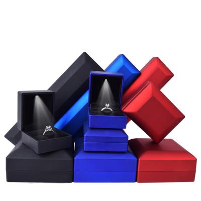 China Blue Bright Product Packaging Rectangle Jewelry Plastics Personalized Packaging Led Jewelry Boxes for sale