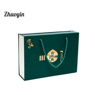 China Recyclable Fancy Logo Printed Hard Cardboard Paper Box With Handle For Tea Packaging for sale