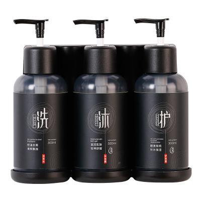 China Foam Soap Dispenser No Hand Sanitizer Material ABS Wall Mount Shampoo Shower Gel Triple Drilling Soap Dispenser for sale