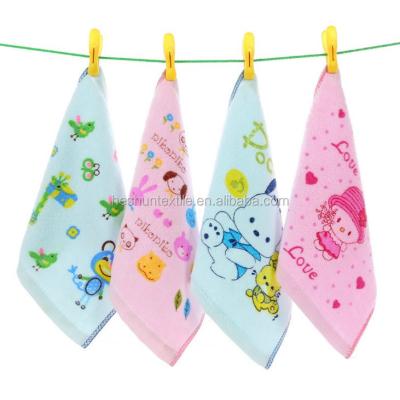 China Super-cheap compressed China terry 100% cotton printed cartoon kids baby face mini towel for sale