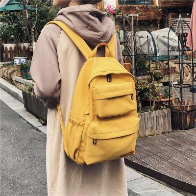 China 2019 Women's Multi Pocket Waterproof Nylon Travel Solid Color Backpack Backpacks Teenager Large Capacity School Bag for sale