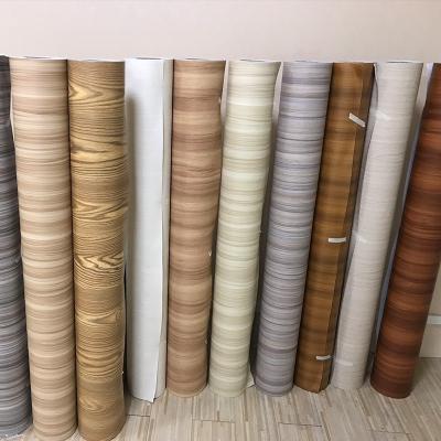 China Vacuum Press Decorative Furniture Film Embossed PVC Self Adhesive Foil for sale