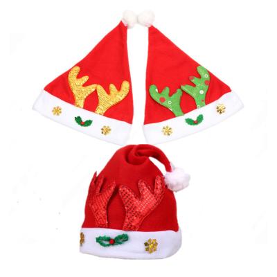 China Cheap Christmas Cute Antlers Cute Santa Hat Felt Red Hat Kids Promotion Gift Decoration for sale