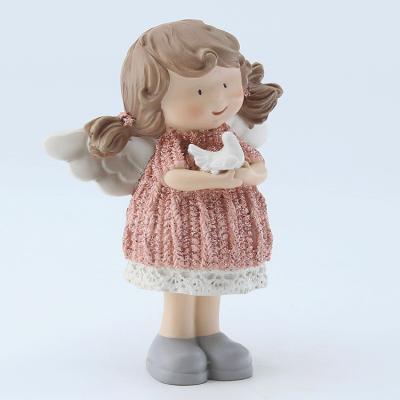 China Europe Resin Figurines To Paint Angel Figurines With Knit Dress And White Bird for sale