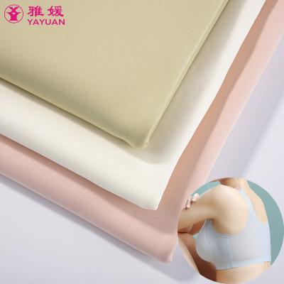 China Factory Direct Sales Shiny Nylon Spandex Fabric Shiny Nylon Spandex 63 37 Four Way Stretch Double Faced Half Knit Fabric Bra Wear Fabric for sale