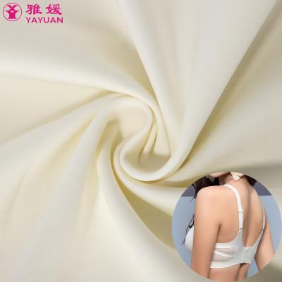 China Double Faced Semi-Gloss High Elastic Stretch Bras Swimwear Yoga Fabric 20/40 Weft Knitted Nylon Spandex Plain Dyed Stretch Fabric For Clothes for sale