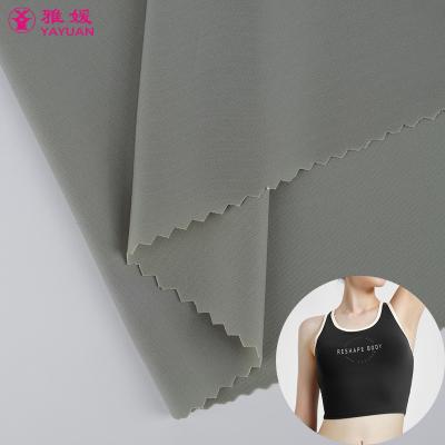 China Hot Selling Double Faced Air Layer Shiny Four Sided 51% High Elastic Spandex 49% Nylon Sports Wear Bras Tube Top Knit Fabric for sale