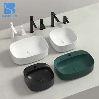 China Modern Different Type Small Ceramic Porcelian Table Top Wash Hand Basins for sale